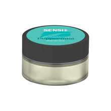 Load image into Gallery viewer, A compact, round, clear plastic container featuring a black lid and labels reading "Sensi Skin" and “100mg CBD Lip Balm - Peppermint,” with 25ml of product. The vegan-friendly label is mint green with white and black text. The CBD lip balm inside appears white.